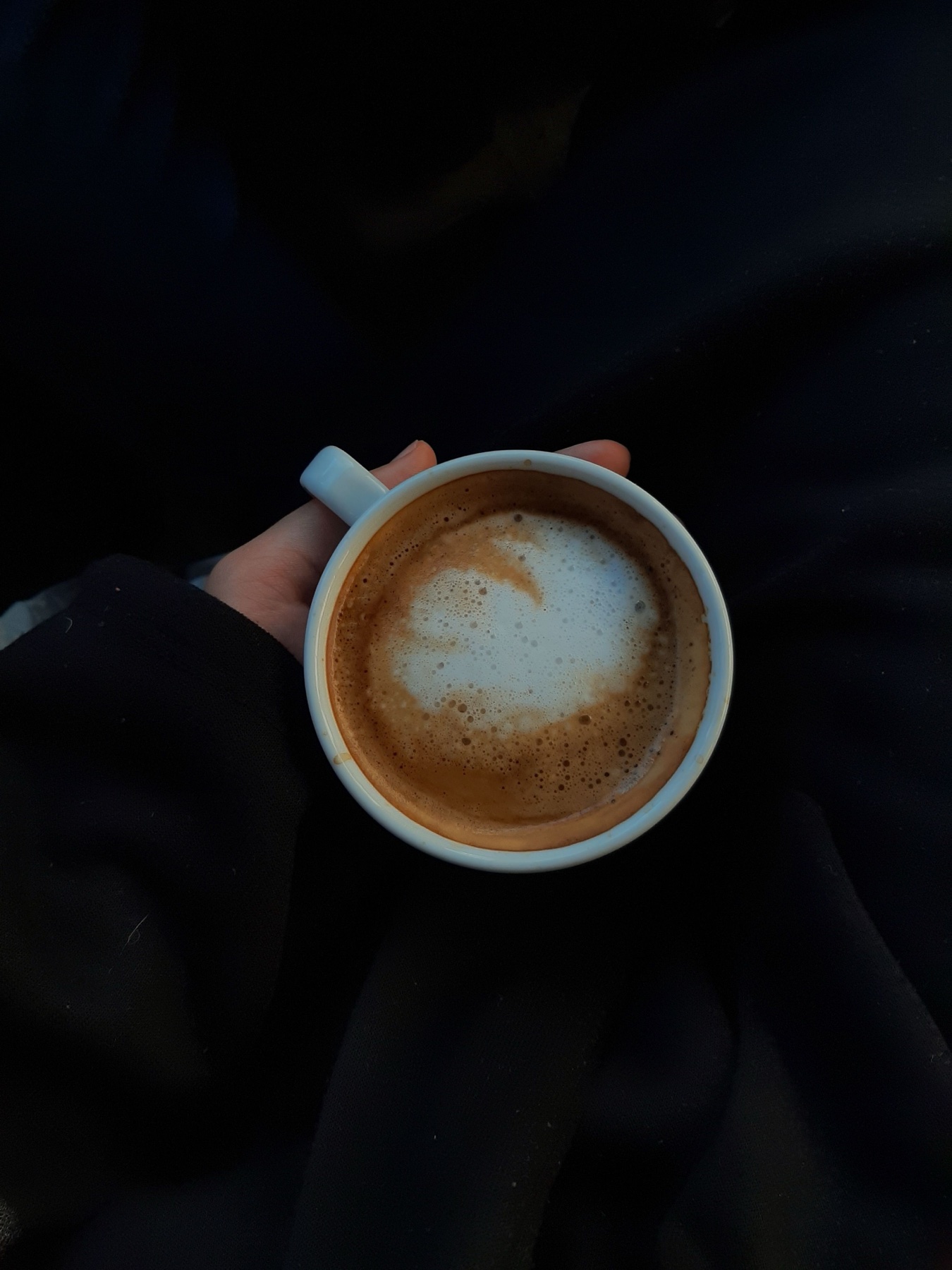 Two coffees on a table